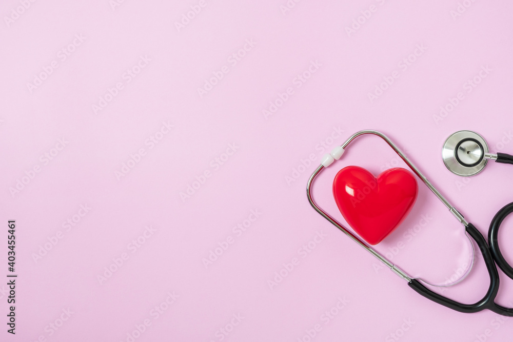 Closeup Stethoscope with red heart, healthcare heart check concept, world heart health day, health insurance concept. copy space