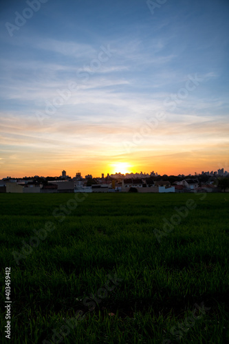 Photos of the sunset at the end of the day with the outline of the buildings in londrina, parana, brazil