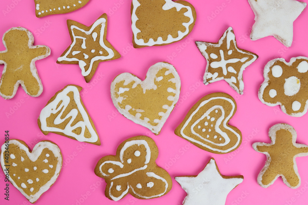 Background of hand-painted gingerbread on pink Background of hand-painted gingerbread on pink
