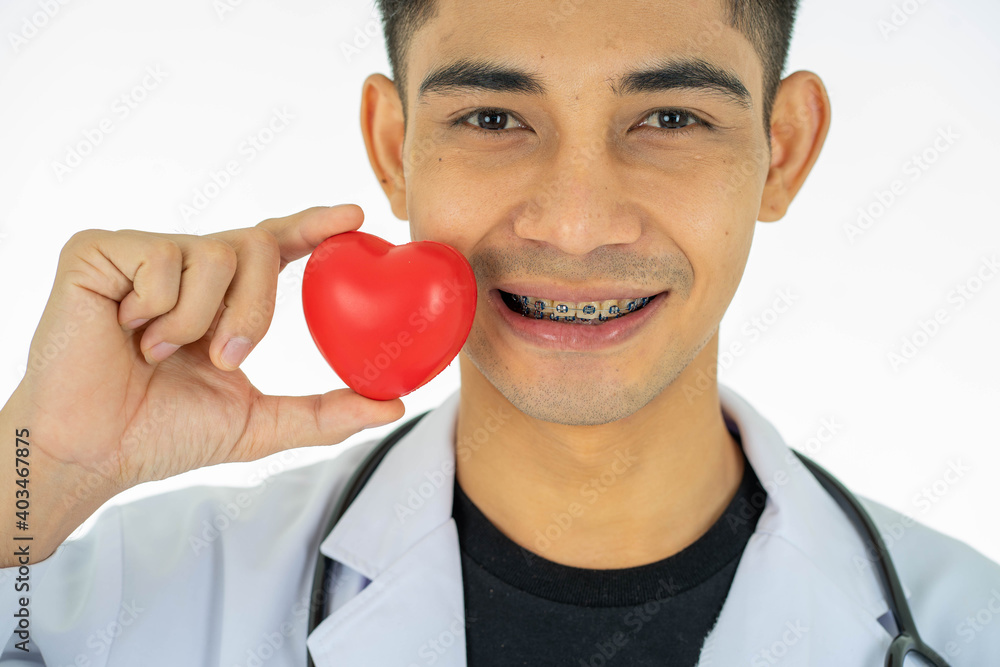 Asian medical doctor dentist with baraces on white background cope space. healthcare and medicine concept. Asian medical doctor dentist with baraces on white background cope space. healthcare and medicine concept.