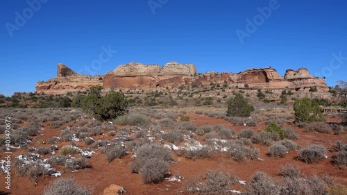 Famous Utah Rock Formation in desert  on Blue sky background after first snow. 