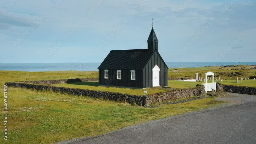 Budakirkja church in Snaefellsjoekull national park, Iceland. Aerial drone circle footage.