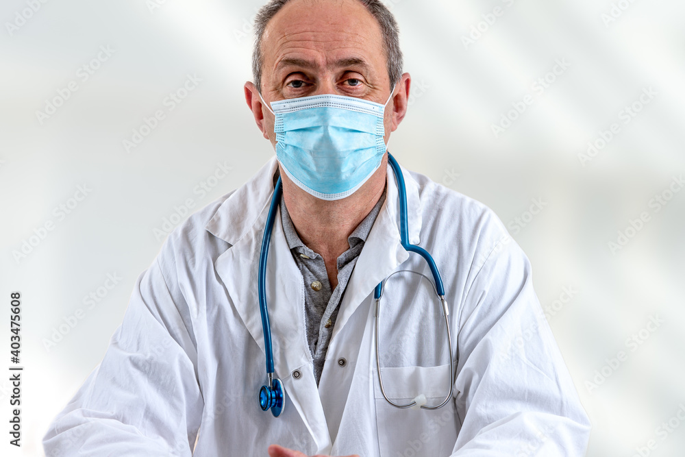 portrait of a doctor at hospital wearing protective mask portrait of a doctor at hospital wearing protective mask