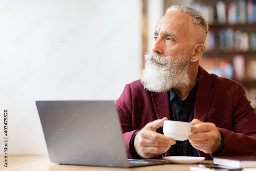Rich senior man in stylish suit drinking coffee at cafe Rich senior man in stylish suit drinking coffee at cafe
