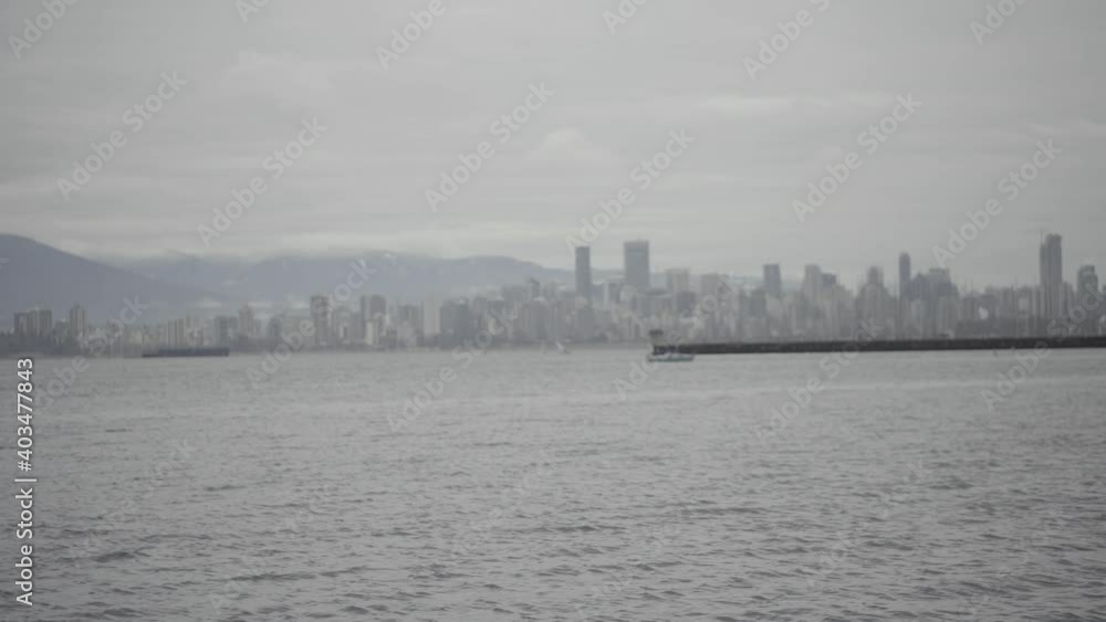 Beach view of Vancouver, British Columbia on an overcast day. Beach view of Vancouver, British Columbia on an overcast day.