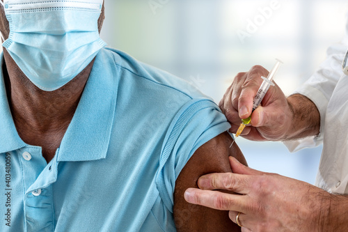 Coronavirus or other disease vaccination to male patient