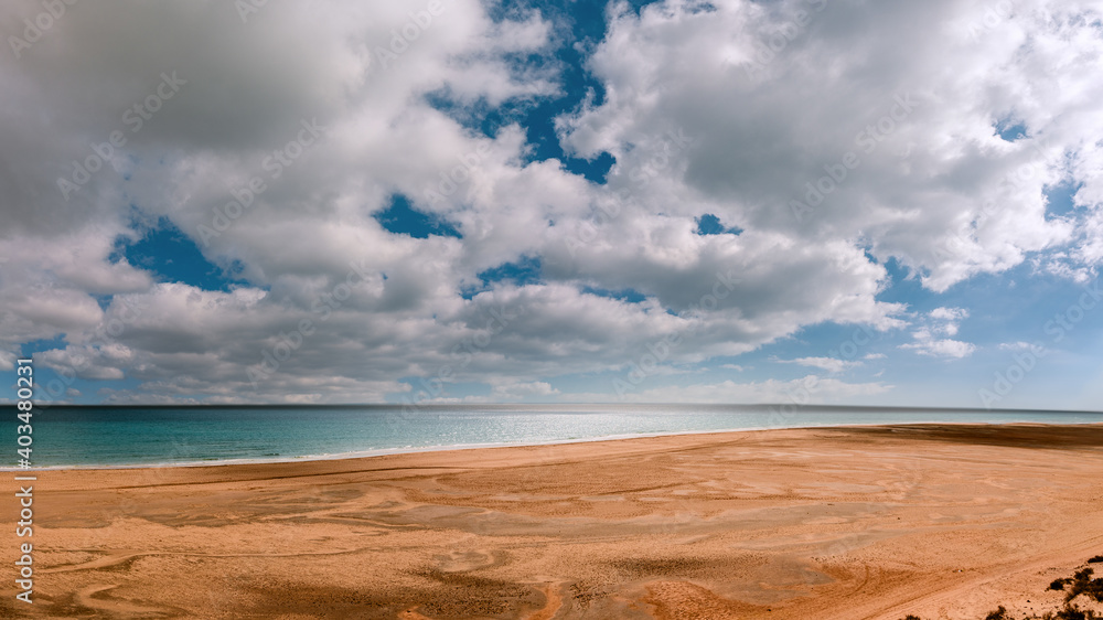 Amazing beach with endless horizon.  Background and Atlantic Ocean. Beach, Fuerteventura, Canary Islands, Spain