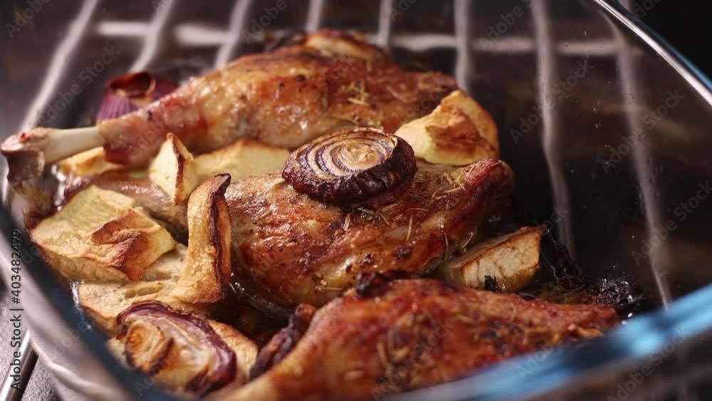 Beautiful roasted duck legs in apples and onions. Beautiful roasted duck legs in apples and onions.