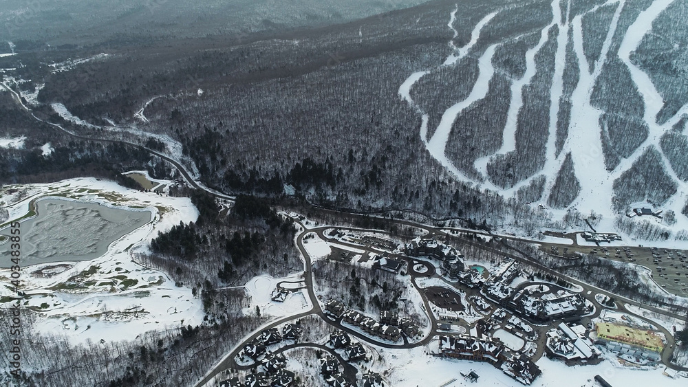 Aerial view to Stowe Mountain Ski Resort in Vermont, USA. Early winter 2020 season.