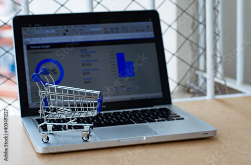 Online shopping - Laptop and Trolley