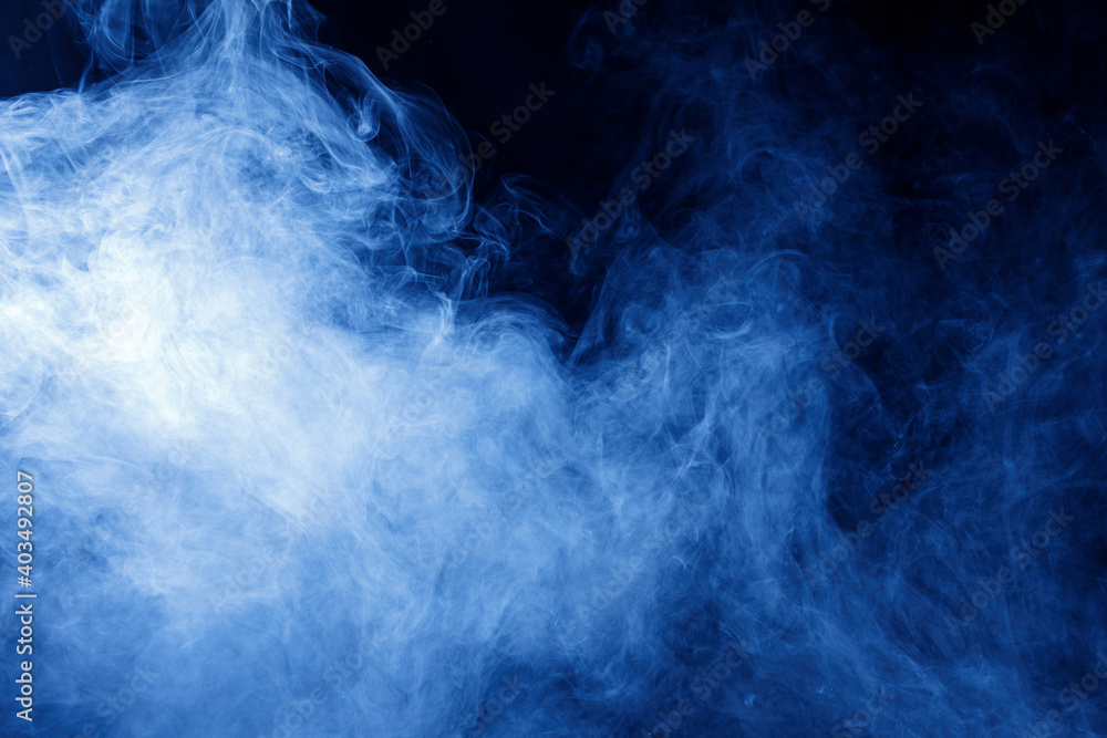 Abstract blue smoke moves on black background. Swirling smoke. Abstract blue smoke moves on black background. Swirling smoke.