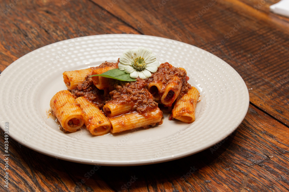 Rigatoni pasta with lamb sauce and ragout.