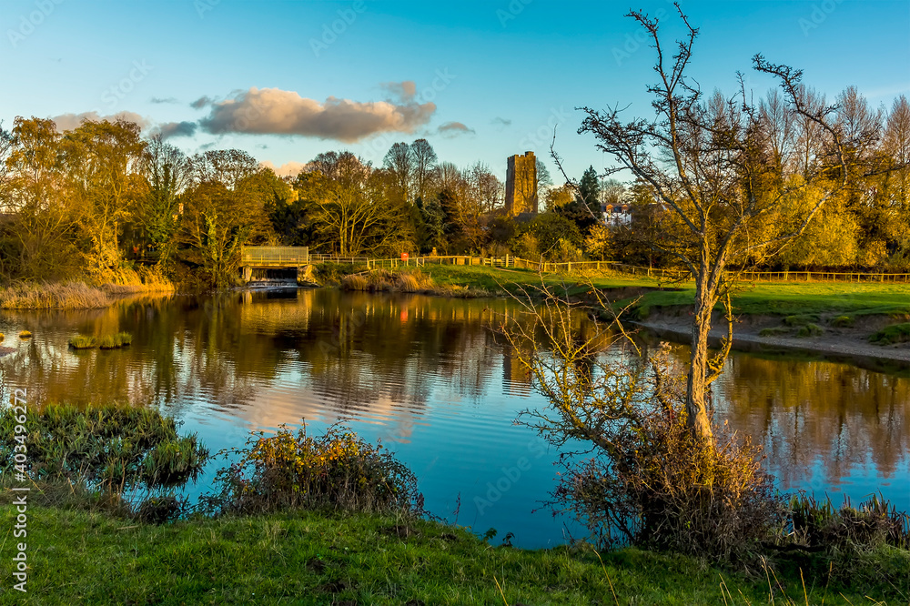 A view across a lake on the River Stour on the western edge of Sudbury, Suffolk A view across a lake on the River Stour on the western edge of Sudbury, Suffolk