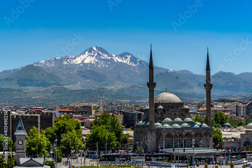 View of the city center in Kayseri and snowy mount Erciyes photo