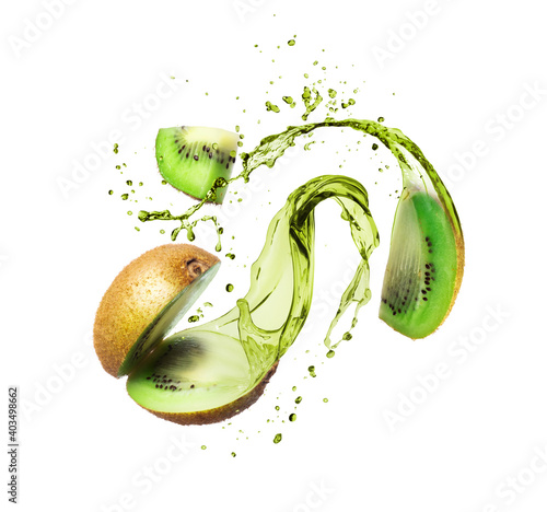 Wallpaper Mural Whole and sliced kiwi with splashes of juice, isolated on a white background