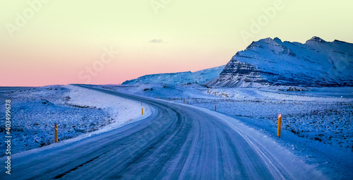 Beautiful shot of an ice road at sunset