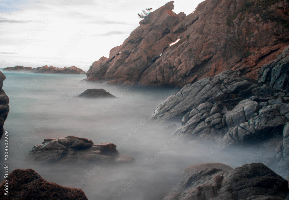 Mesmerizing view in a rocky beach of Cala Roques Planes located in Sant Antoni de Calonge