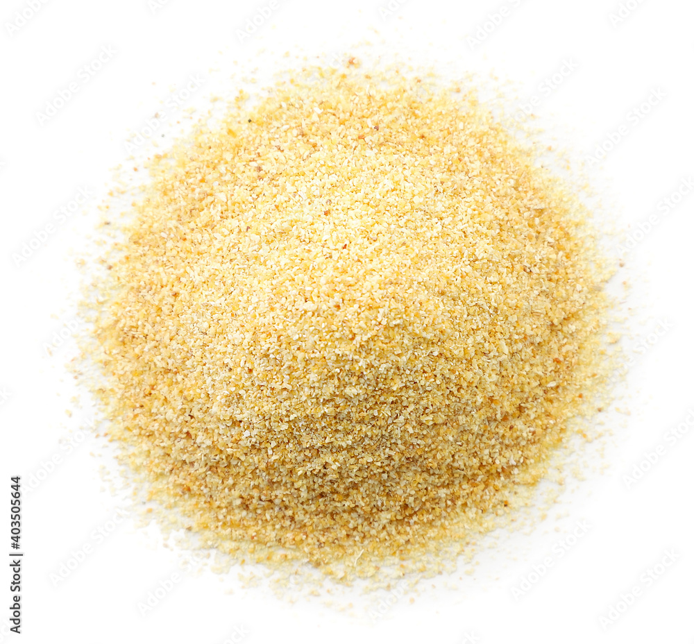 Heap of ground garlic on white background, isolated. The view from top Heap of ground garlic on white background, isolated. The view from top