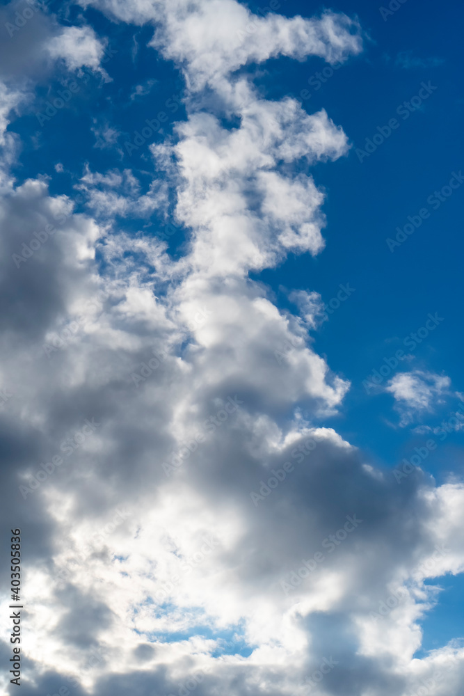 Obraz premium Dramatic sky with thunderclouds and hidden sun