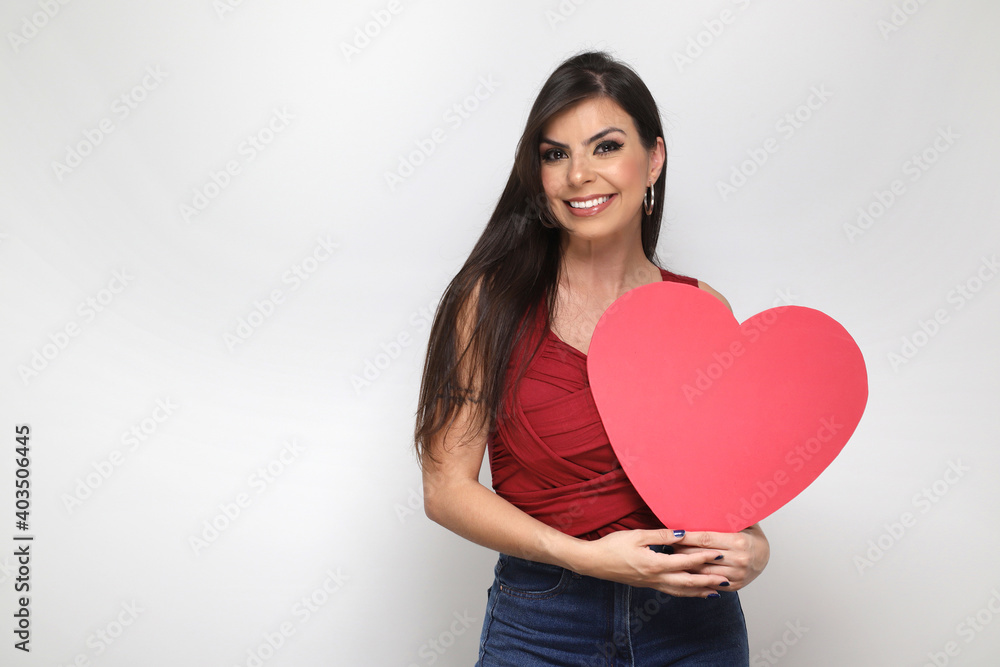 beautiful girl holding valentine's gift on white background beautiful girl holding valentine's gift on white background
