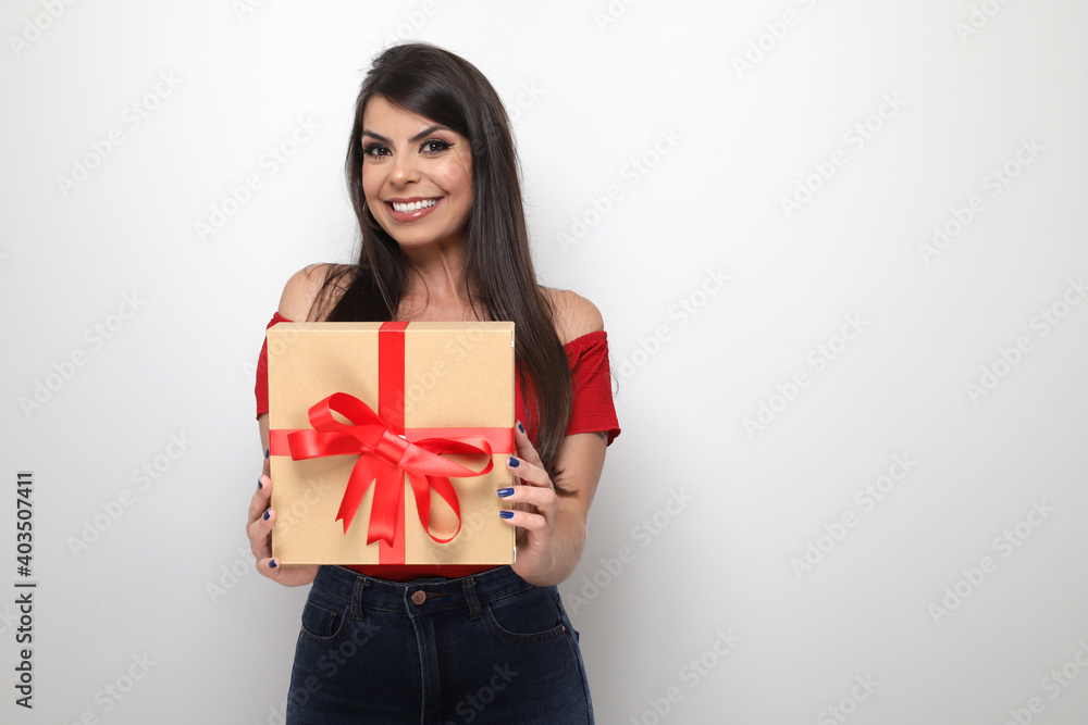 beautiful girl holding valentine's gift on white background beautiful girl holding valentine's gift on white background