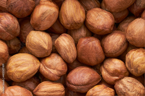 Hazelnut Background. Heap of peeled hazelnuts, food background