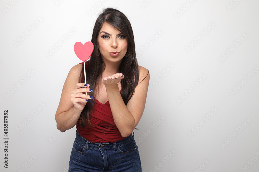 beautiful girl holding valentine's gift on white background beautiful girl holding valentine's gift on white background