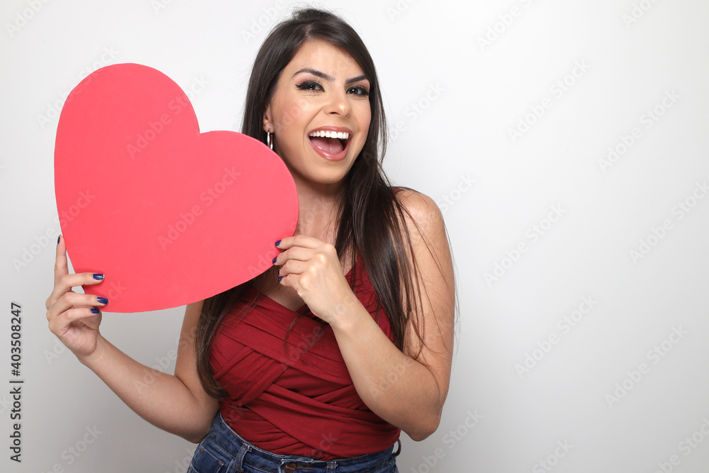 beautiful girl holding valentine's gift on white background beautiful girl holding valentine's gift on white background