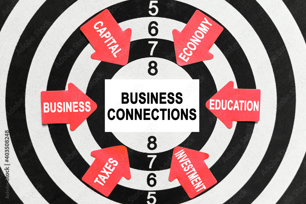 On the target, arrows with business lettering point to the center on a business card with the inscription - BUSINESS CONNECTIONS On the target, arrows with business lettering point to the center on a business card with the inscription - BUSINESS CONNECTIONS