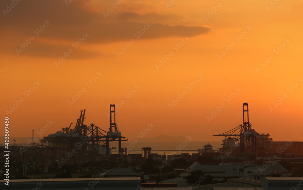Cargo port at twilight sky.