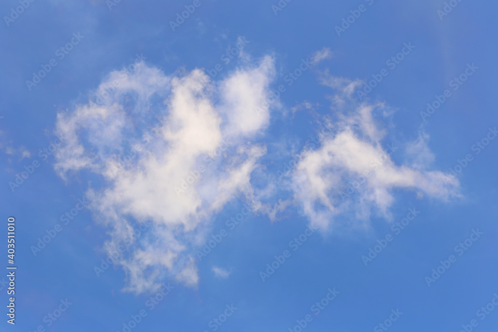Blue sky with white clouds in the daytime background. Blue sky with white clouds in the daytime background.
