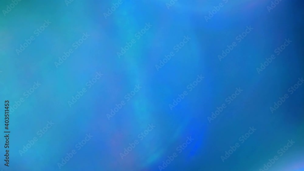 Shimmering blue bokeh spots with color spectrum Shimmering blue bokeh spots with color spectrum