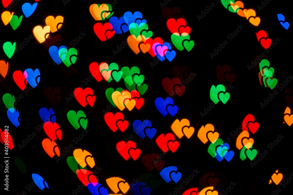 Colorful abstract heart bokeh background lights. Valentines day texture pattern. Romantic background