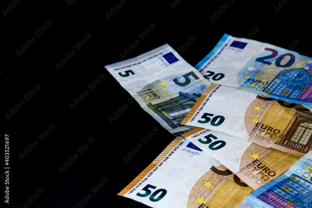 Money Euro value banknotes, European Union payment system, isolated on black Money Euro value banknotes, European Union payment system, isolated on black
