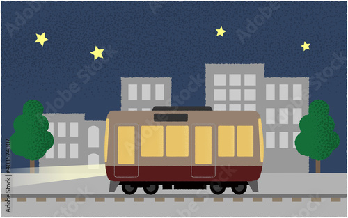夜、ライトを点けて都市を走る電車のベクターイラスト
