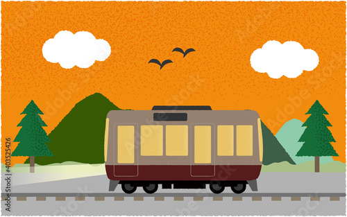 夕方、ライトを点けて山沿いを走る電車のベクターイラスト