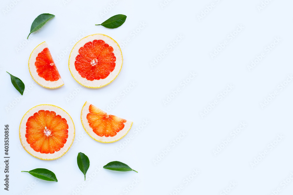 High vitamin C. Juicy grapefruit slices on white. High vitamin C. Juicy grapefruit slices on white.