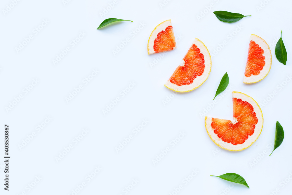 High vitamin C. Juicy grapefruit slices on white. High vitamin C. Juicy grapefruit slices on white.