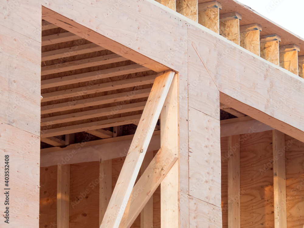 Foto de joists on a wall of a house under construction showing studs