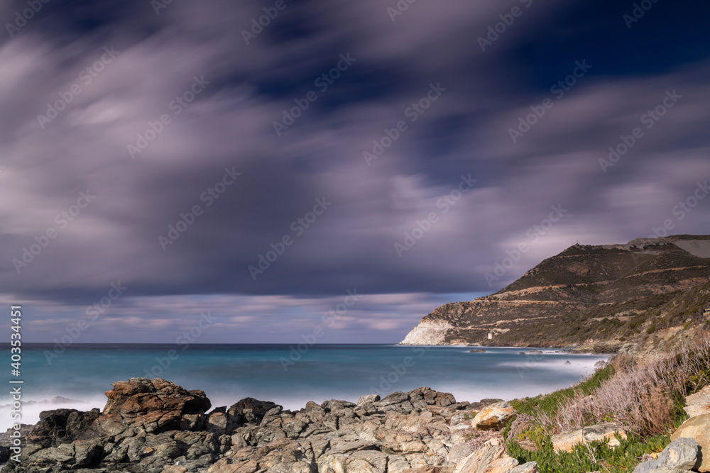 Long exposure of the Mediterranean Sea in Corsica, on a cold winter morning