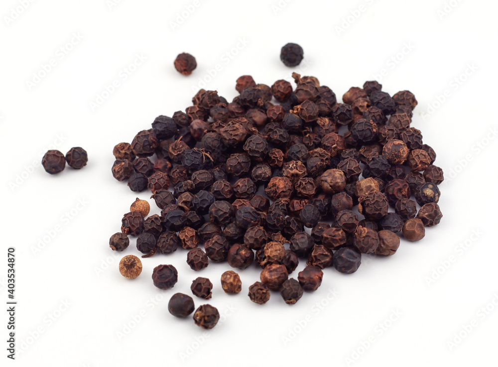Black pepper on a white background Black pepper on a white background