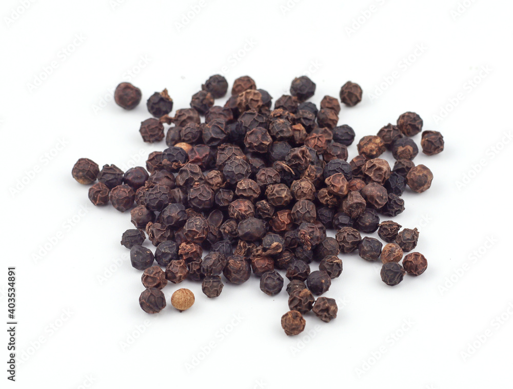 Black pepper on a white background Black pepper on a white background