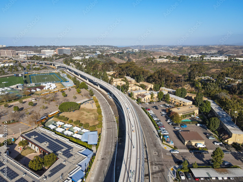 Aerial view of Mid-Coast Trolley bridge in University of California, San Diego, California, USA.