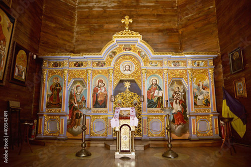 Iconostasis inside Wooden Resurrection Church at the Baturyn fortress. Tourist attraction of the city of Baturyn, Chernihiv region, Ukraine