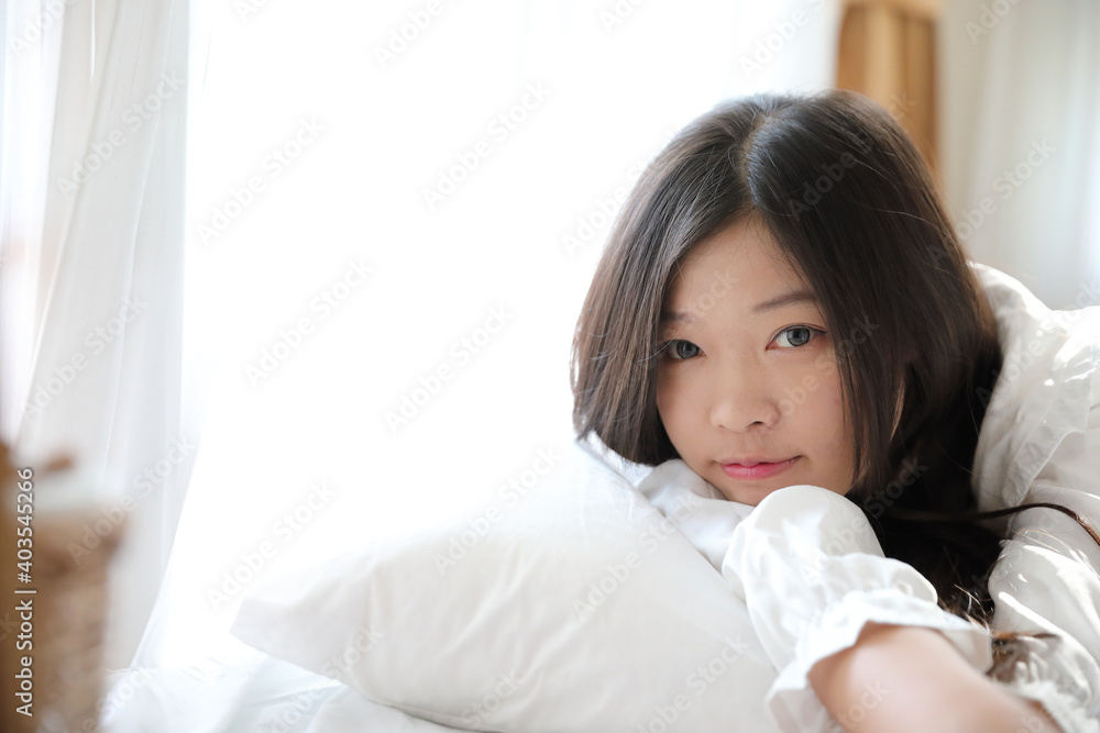 girl sleeping with pillow at white bedroom girl sleeping with pillow at white bedroom