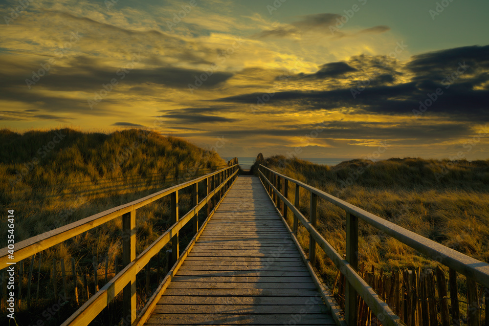 Approach to St Andrews Beach at sunrise. located in fife, scotland.
