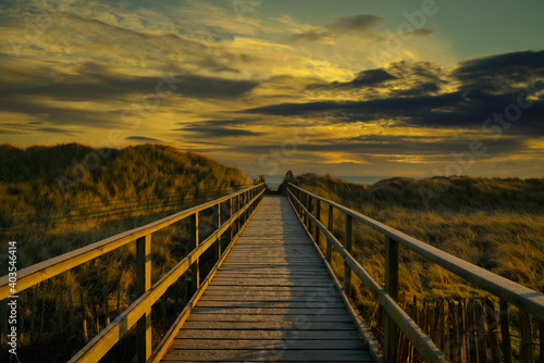 Approach to St Andrews Beach at sunrise. located in fife  scotland.