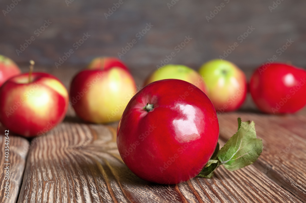 Ripe organic apples on a wooden table. Ripe organic apples on a wooden table.