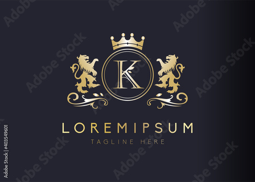 Heraldic lion initial letter K logo design. Vector illustration of luxury royal K letter with floral, crown and lion emblem design. Sign symbol icon template