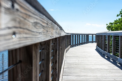 wooden bridge over the sea © Josue